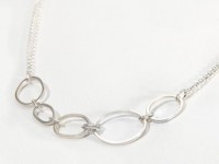Silver Pebble And Knot Necklace